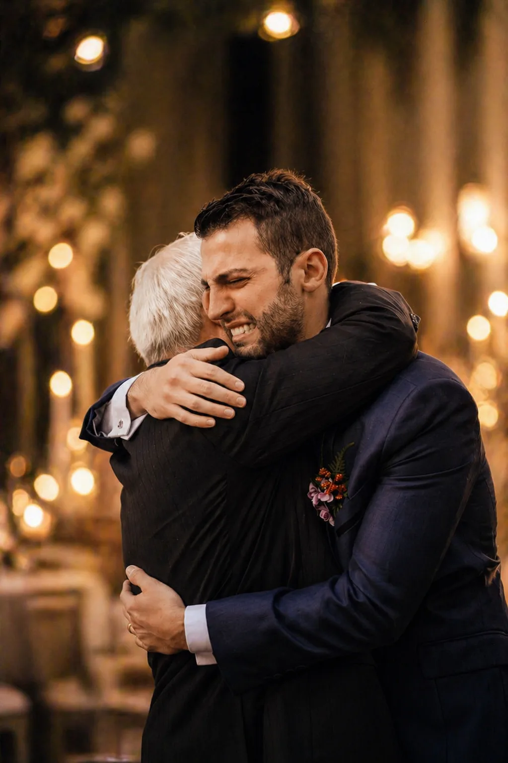 A candid hug captured at a wedding