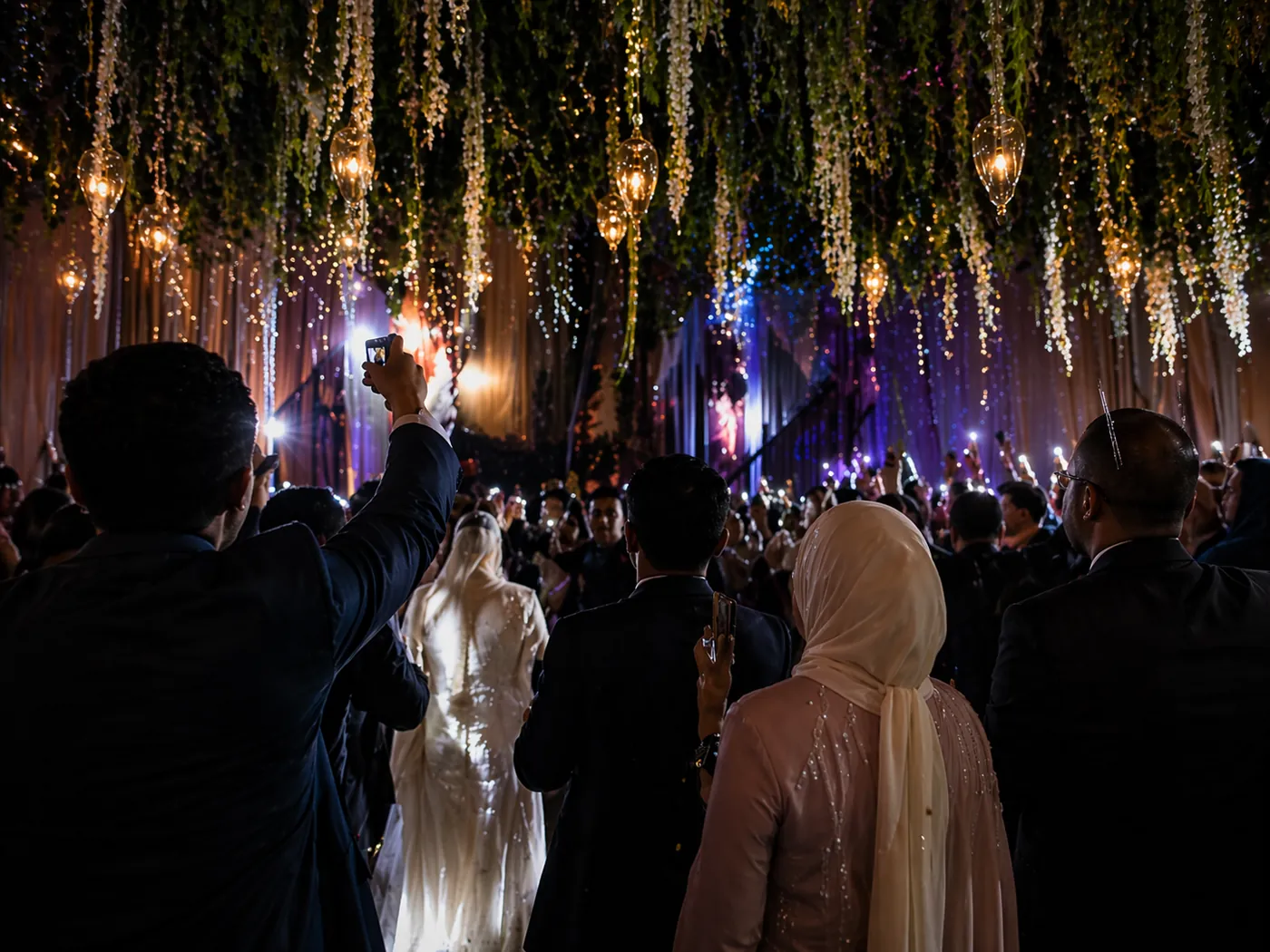 Wedding guests celebrating at the reception