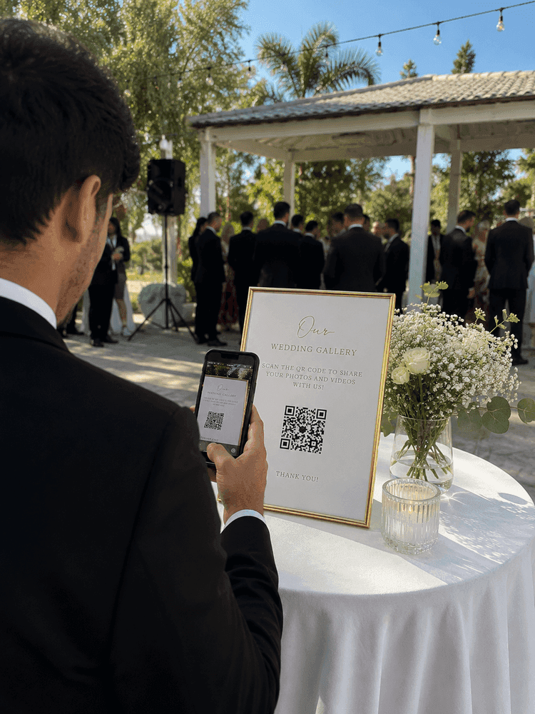 Phone scanning a wedding QR code